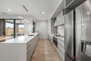 Full sized kitchen with all the things you need to cook up a storm
