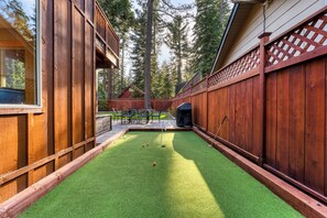 Practice your swing on the putting green.