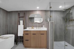 Master bathroom, separate stand alone bathtub and walk in shower