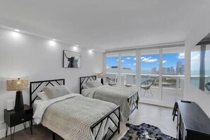 2nd bedroom, two twin beds, streaming tv, balcony access