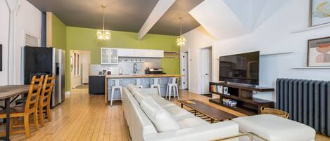 Full picture of Main floor kitchen and living room. Dining room on other side