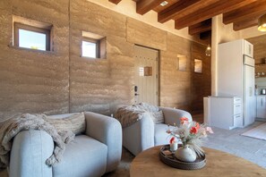 Many of the walls are rammed earth construction. Thick and nearly soundproof.