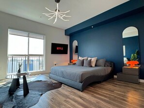 Modern style King size bed with hybrid technology mattress and a stunning Downtown Los Angeles skyline view