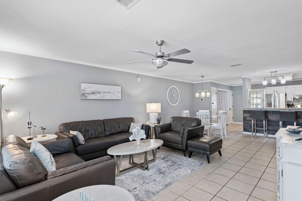 Spacious Living Room with Large TV 