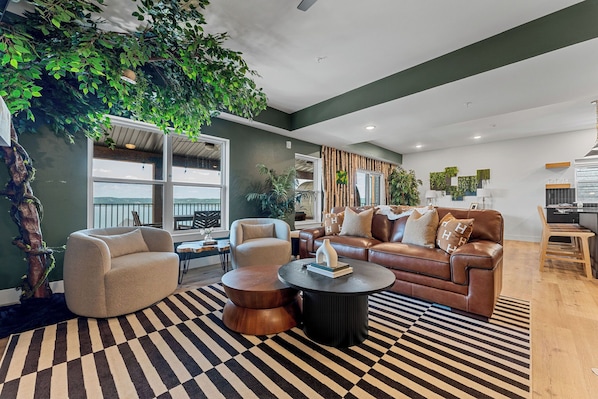 Open concept living, dining, and kitchen with amazing views of Table Rock Lake