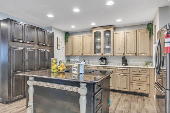 Farmhouse Kitchen, Labeled Cabinets with All Supplies