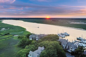 Welcome to this beautiful waterfront villa at 1970 Marsh Oak Road at the Bohicket Marina Village!