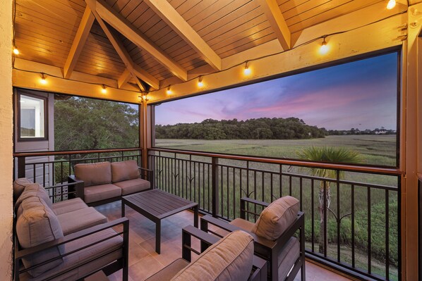 Welcome to this beautiful waterfront villa at 1970 Marsh Oak Road at the Bohicket Marina Village!