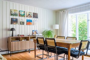 Dining area with views to the garden and ample seating for all