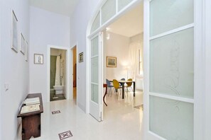 Hallway to living area and bedroom