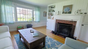 Living room with comfortable seating and flat screen TV