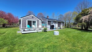 Lovely backyard with deck, firepit and gas grill