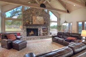 Living Area with Fireplace and Lots of Windows - Living Area with Fireplace and Lots of Windows