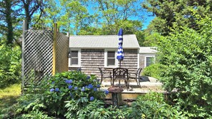 Deck with table and outdoor shower 