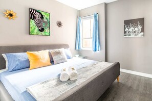 Spacious Bedroom With King Size Bed And Plenty Of Light