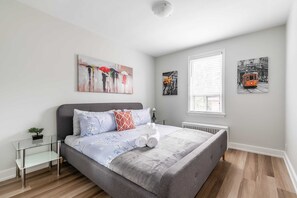 Spacious Bedroom With King Size Bed And Plenty Of Natural Light