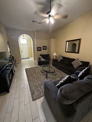 Cozy up in the living room with a Smart TV.