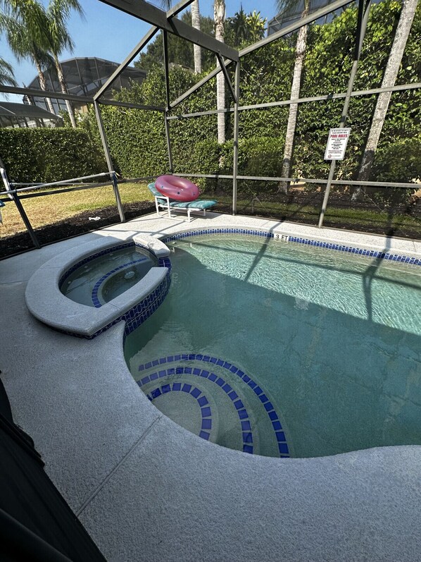 Unwind by the poolside, complete with a relaxing hot tub.