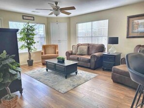 Large living space with lots of seating.
