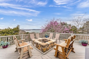 Amazing deck with built in firepit - wood underneath the deck