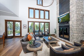 Relax by the wood burning fireplace in the home`s great room.