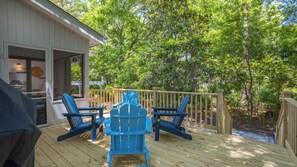 Embrace outdoor living at its finest. Our deck is your ideal spot for gatherings, with comfortable seating, a welcoming atmosphere, and a grill ready for BBQs!