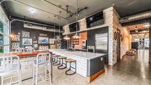 Common area for tenants/guests includes kitchen