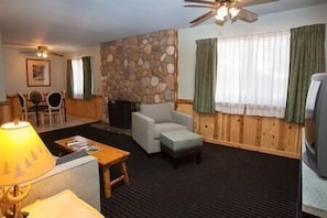 Living room with sofa-bed and sitting area