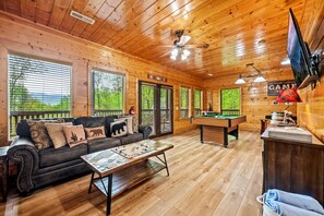 Lower Level Gameroom with Sleeper Sofa, Pool Table, Arcade Game and Board Games