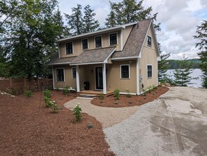 View from driveway to cottage entrance