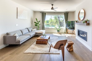 Open living area with beautiful designer furniture.
