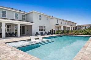 Soak in Florida sunshine while watching the kids play in the pool.