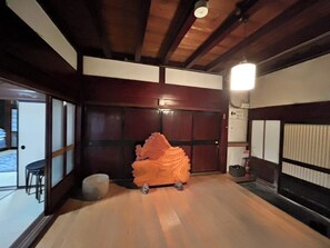 The entrance hall retains the atmosphere of a building dating back approximately 90 years.
