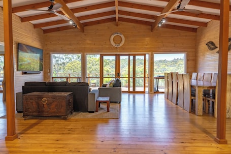 Upstairs living room looking out on to the back deck