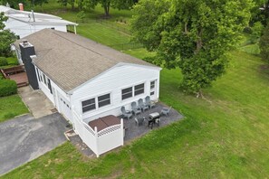 Charming single-story home with an attached garage, front patio, and a private fenced-in side yard. Enjoy a night time fire or a dip in the hot tub!