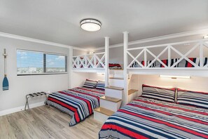 2nd bedroom includes custom built bunks that have 2 kingsize beds and 2 twin XL beds on top.  Also has USB ports and lighting at each sleep space.