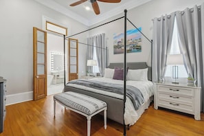 "Fats Domino" Downstairs master bedroom with 12' ceilings including king size bed, walk in closet, 55" smart TV, blackout curtains and a private ensuite.
