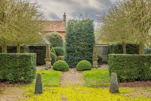 Well-kept mature gardens