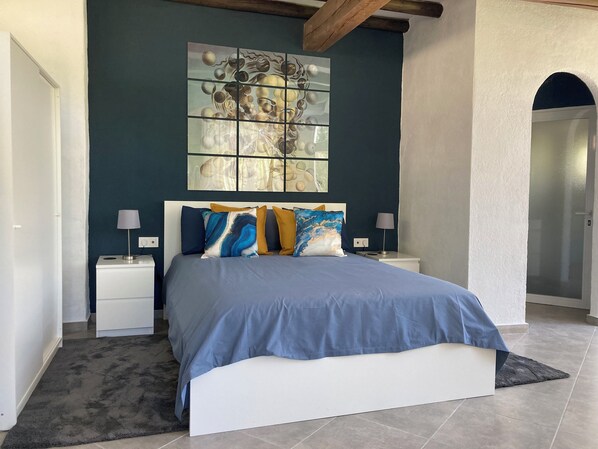 A comfortable King Size Bed with en suite wetroom alongside