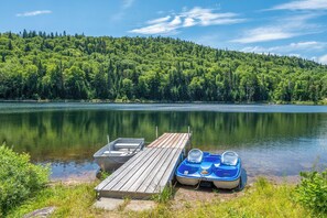 Dock with canoe and pedal boat