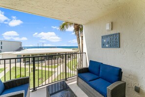Relax with ocean views on the main level balcony