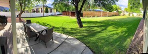 This gorgeous backyard is the perfect spot to relax, play games, enjoy the night sky, or grill dinner!