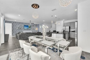 Full view of this gorgeous Dinning Room, Kitchen and Family Room