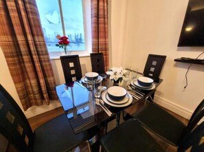 This photo represent the dining table of the property. 