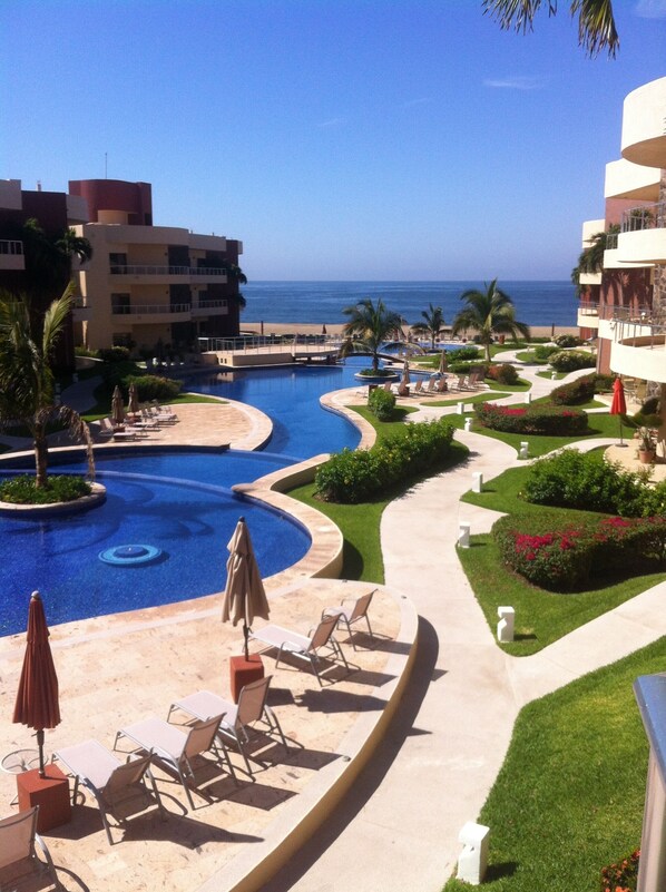 Beautiful cascading pools and beach frontage.