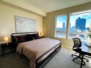 Comfortably enjoy a memory foam King size bed while taking in the breathtaking city skyline of Los Angeles.