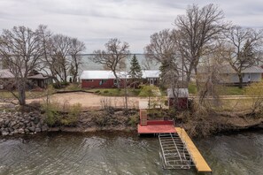 Wow. So, you have the Ottertail Lakefront deck but ALSO a riverside fishing deck AND boat dock with a manual lift. Nice!