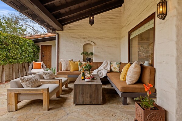 Private courtyard patio offers quiet luxury