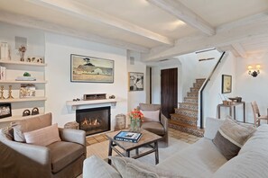 Cozy living room with fireplace and TV