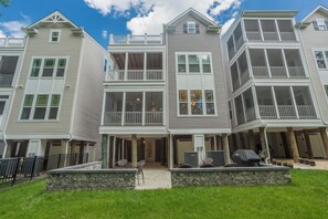 Rear Patio w/ Fire Pit, Gas Grill, and Seating